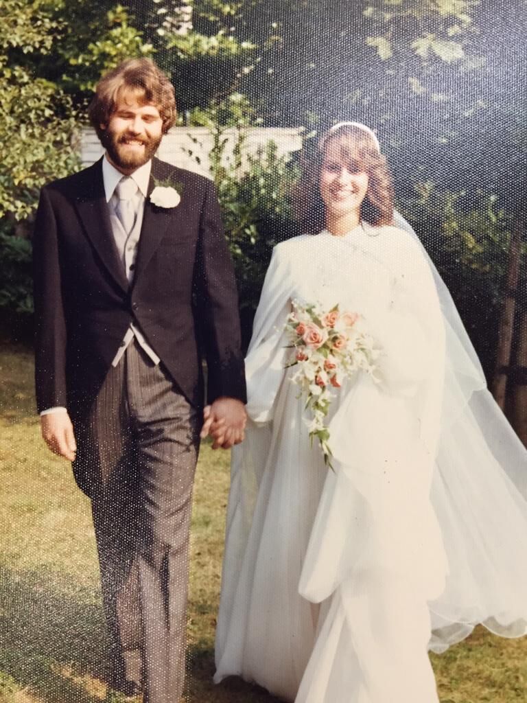 a photo of a man and a woman on their wedding day