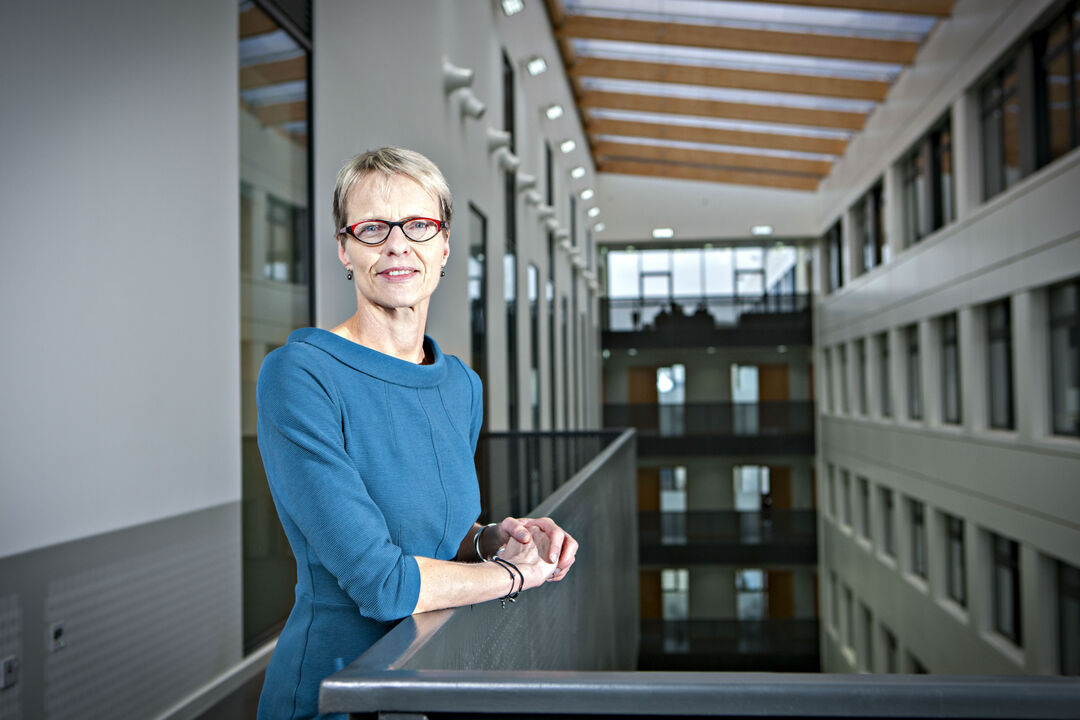 Inke Näthke standing looking at the camera