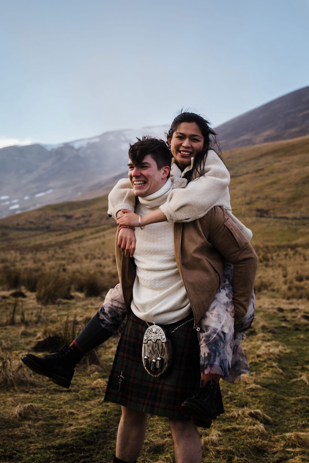 Xiaoxiao Zhang and James walking down a hill