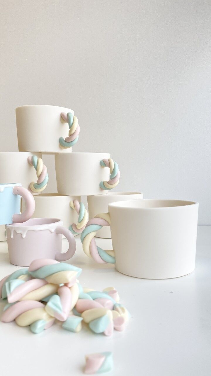 Ceramic necklace designed by Rebecca with twisted marshmallow handles