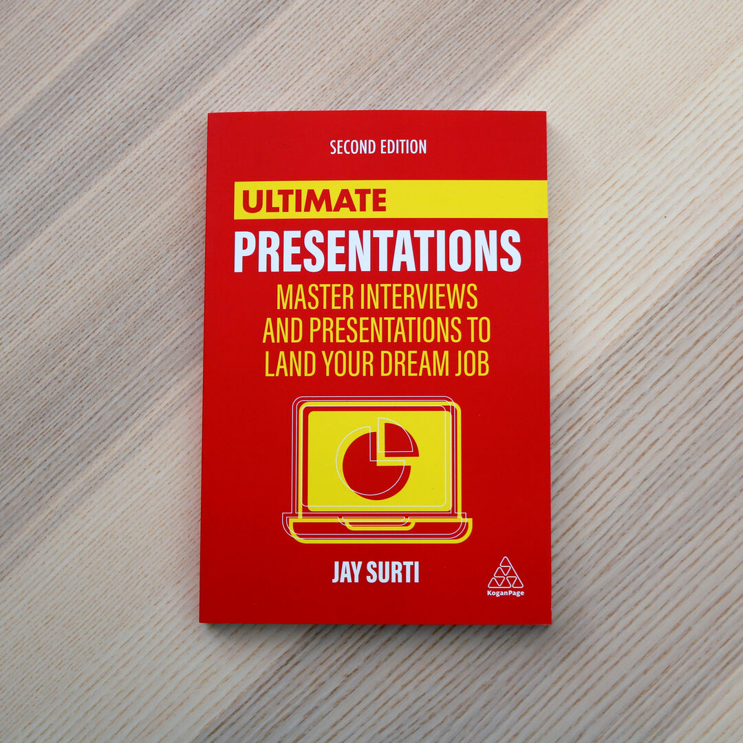 Cover of Ultimate Presentation, a book by Jay Surti, sat on a table