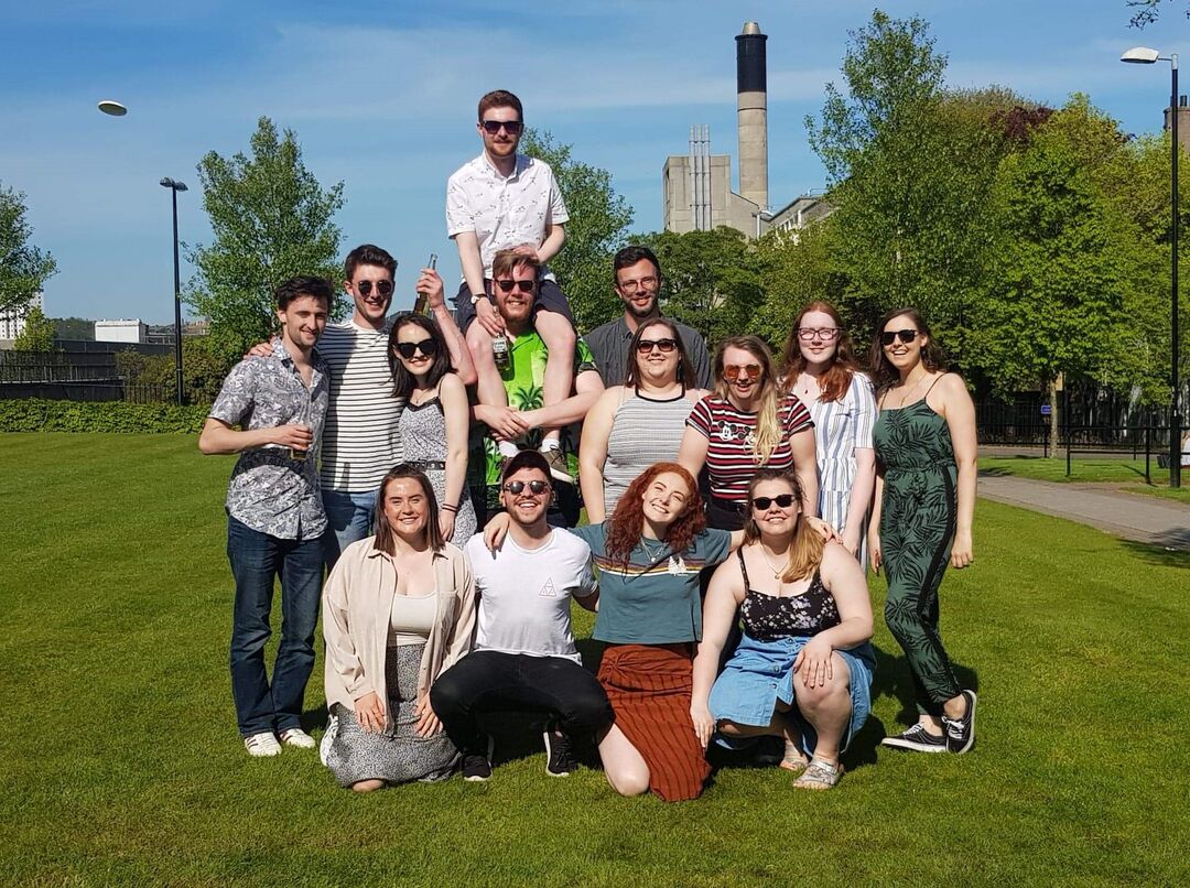 Lewis Kennedy (second from left, bottom row) and classmates on campus green