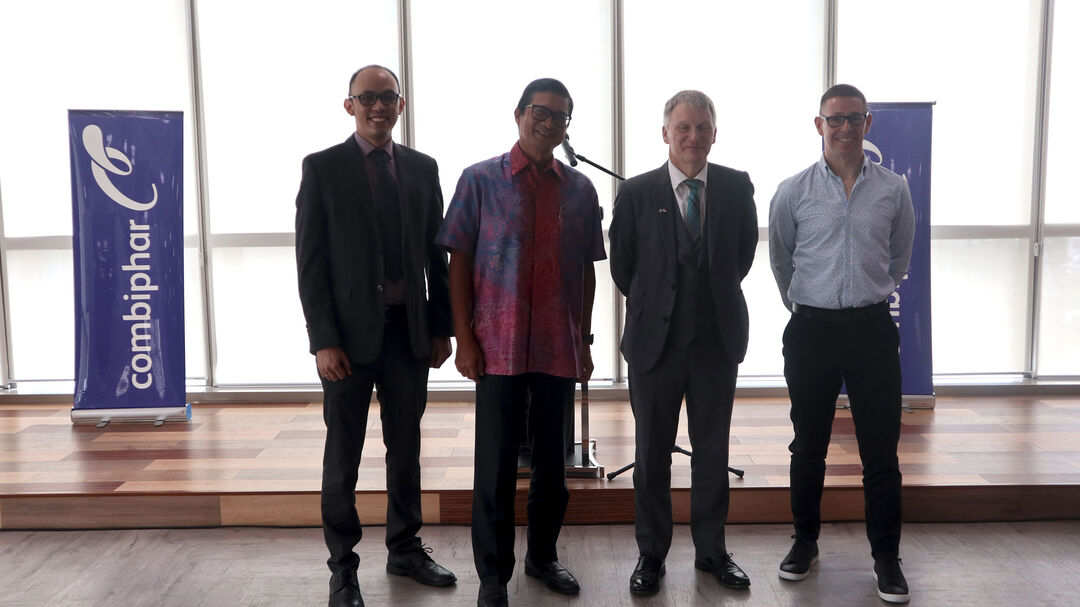 Mr Ivan Mckee and three others at the meeting in Jakarta.