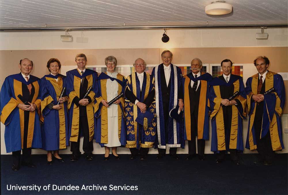 A group of people receiving honorary degrees.