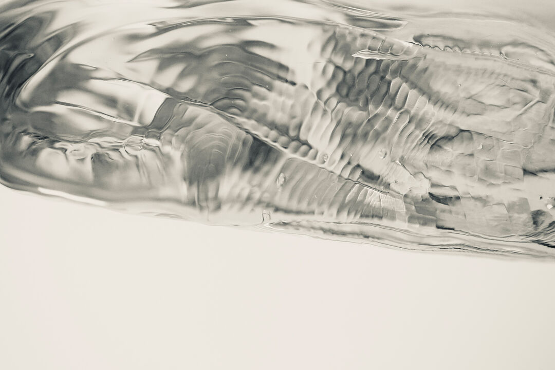 Molten glass unfolded into its own material agency, thereby becoming a wrinkled liquid form. Represented in photographic form