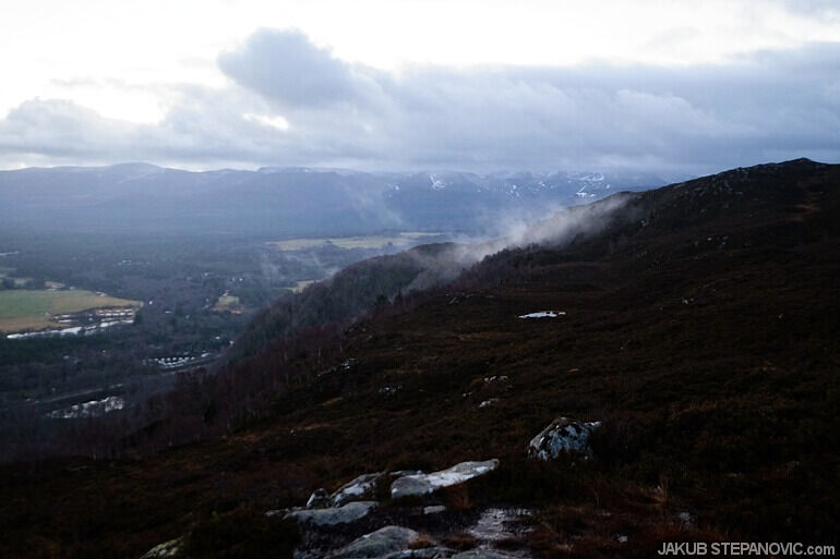view from top of mountains over valleys
