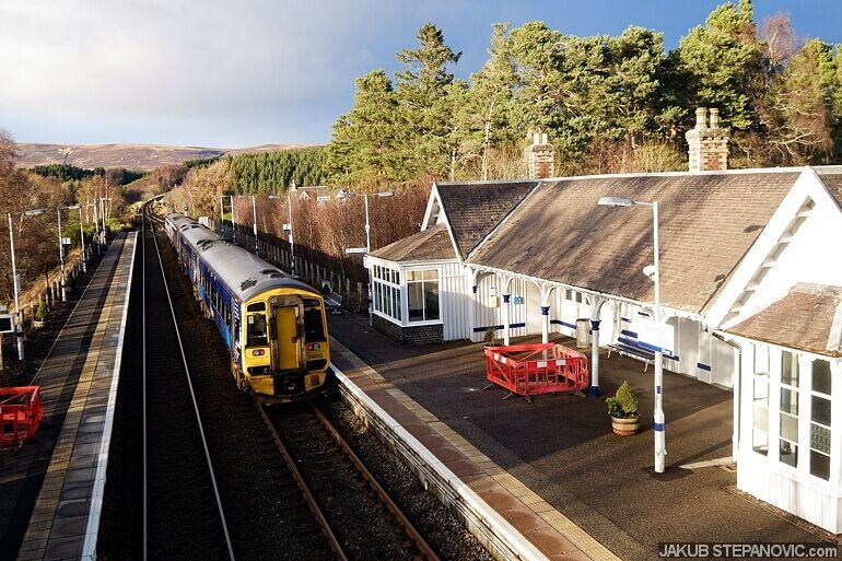 train at rural railway station