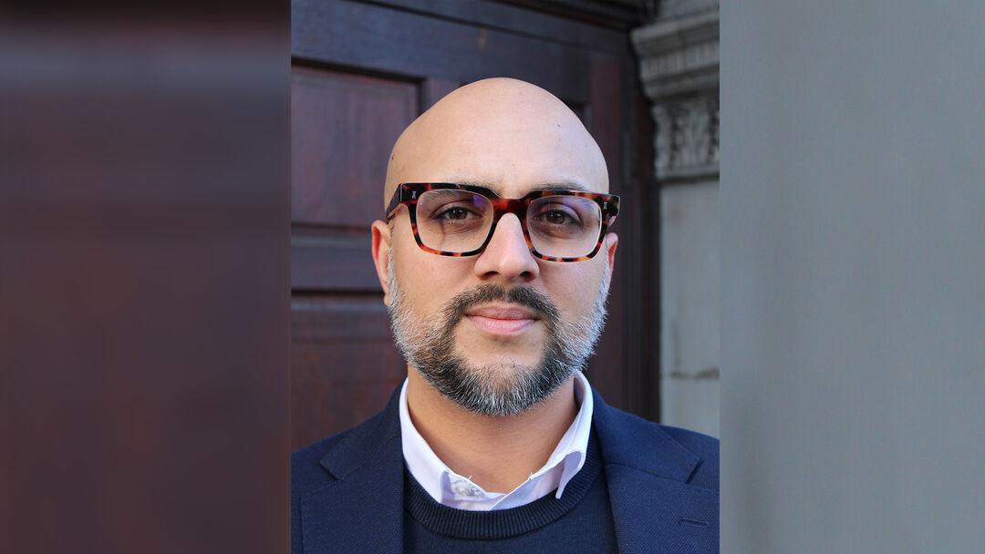 A portrait photo of Dr Arun Verma 