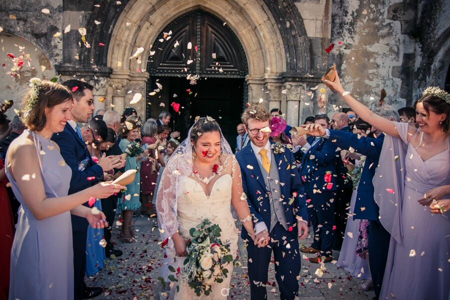 John-Luke Harris and wife Margardia leave church on their wedding day