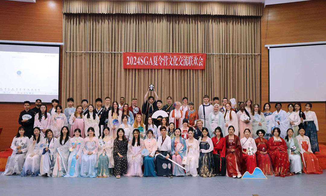 A group of students dressed in traditional Chinese clothes