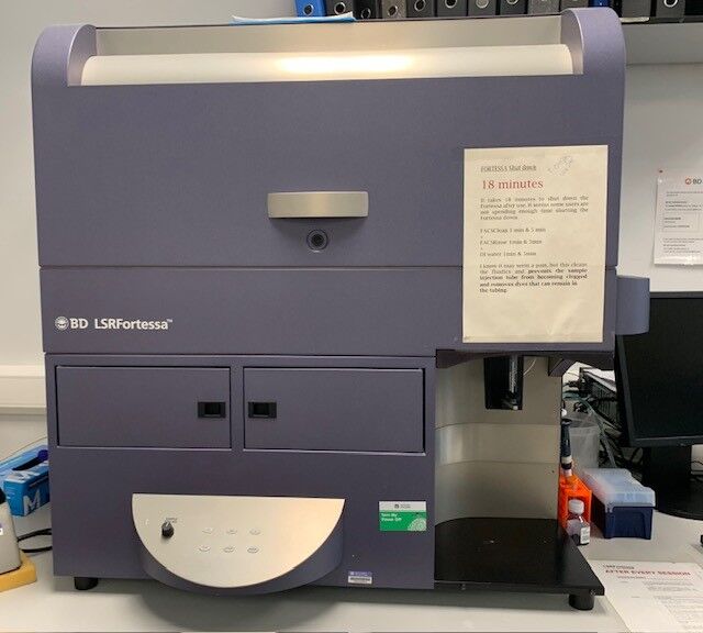 Photograph of a large blue bench top flow cytometer called BD LSRFortessa