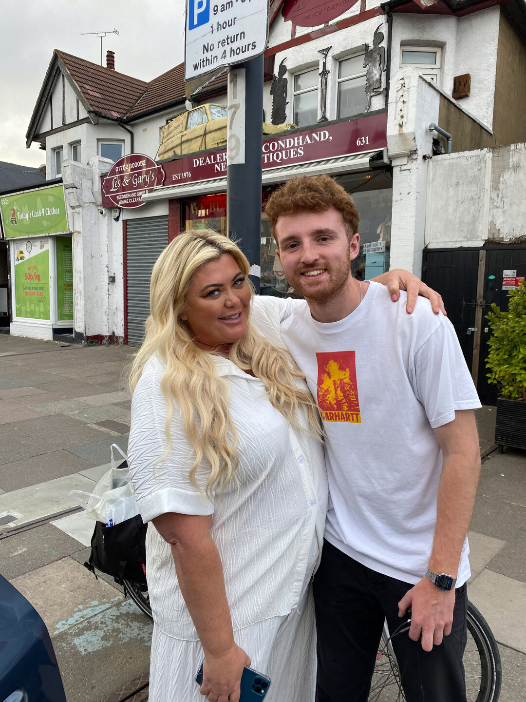 Graduate Euan McClenaghan poses with Gemma Collins during filming for Celebrity Antiques Road Trip