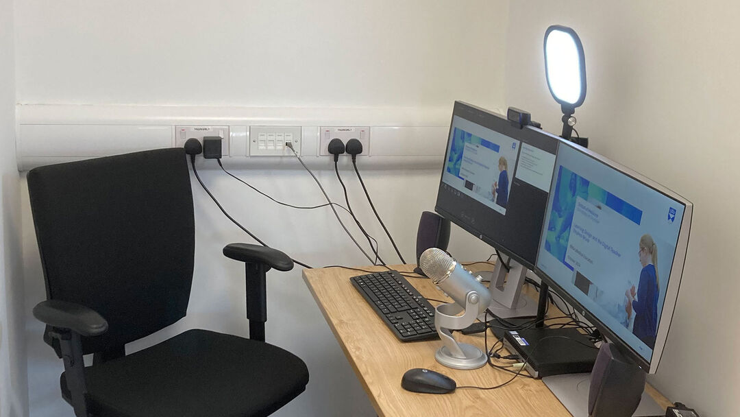 TILT recording pod with two screens, microphone and light