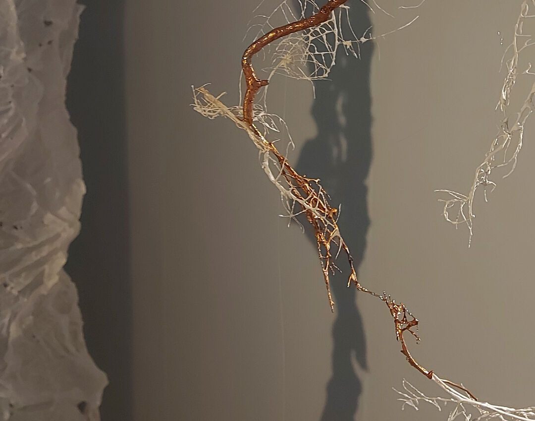 Fragile copper artwork installation at the Master Showcase exhibition